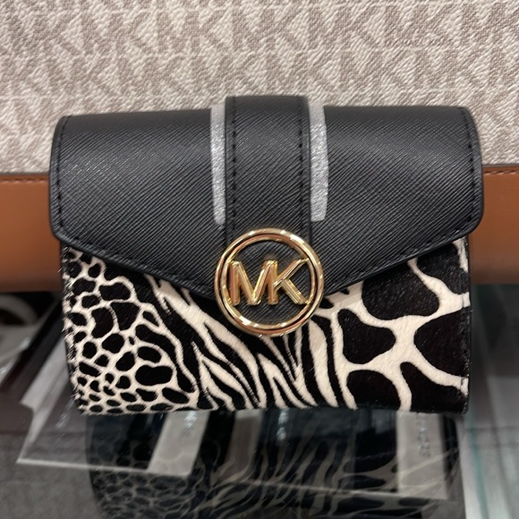 MICHAEL KORS
Carmen Medium Flap Bifold Faux Fur-Leather Wallet
Black 
NWT - Picture 7 of 16